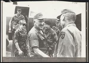 Laotian campaign leaders who met yesterday at Quang Tri, S. Vietnam, for secret conferences with allied commanders. Left to right: U.S. Military commander Gen. Creighton W. Abrams, and Lt. Gen. J.W. Sutherland, Behind them wearing beret's Lt. Gen. Hoang Xuan Lam, joint campaign commander.