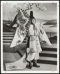 "The Mikado," most famous of all Gilbert and Sullivan operas, will open the two weeks engagement of the D'Oyly Carte Opera Company at the Shubert on Monday, Oct. 29. Shown here is Donald Adams in the title role of the production.
