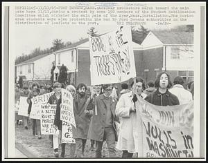 Fort Devens, Mass.: Antiwar protestors march toward the main gate here 11/11, during a protest by some 150 members of the Student Mobilization Committee which picketed the main gate of the Ayer, mass. installation. The Boston area students were also protesting the ban by Fort Devens authorities on the distribution of leaflets on the post.