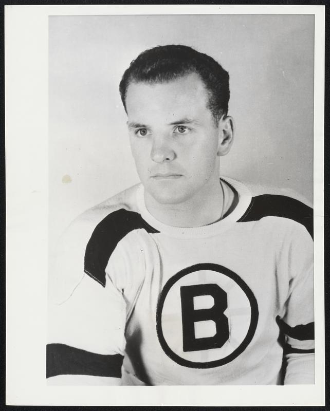Boston Bruins Wingman. Edward Michael Sandford, wingman for the Boston Bruins of the National Hockey League. Born in New Toronto, Ontario, August 20, 1928. He is 6 feet 1 inch tall and weighs 190 pounds. Sandford shoots right.