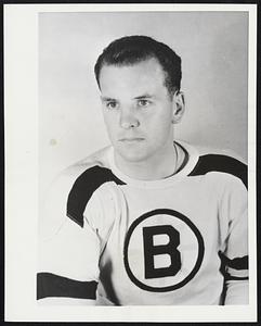 Boston Bruins Wingman. Edward Michael Sandford, wingman for the Boston Bruins of the National Hockey League. Born in New Toronto, Ontario, August 20, 1928. He is 6 feet 1 inch tall and weighs 190 pounds. Sandford shoots right.