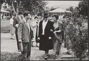 Serge Koussevitzky walking with an unidentified woman