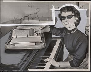 Blind singer teaches piano by braille