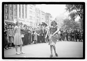 Two young women competing, Boston Common