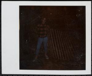 Young woman in plaid jacket