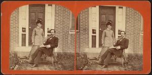 Couple posed before a doorway