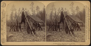 A camp scene - hanging up the big bear