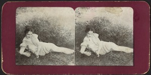 Woman lounging in tall grass
