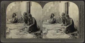 Indian squaw making pottery, Oraibi, Arizona