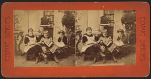 Three children engrossed by books