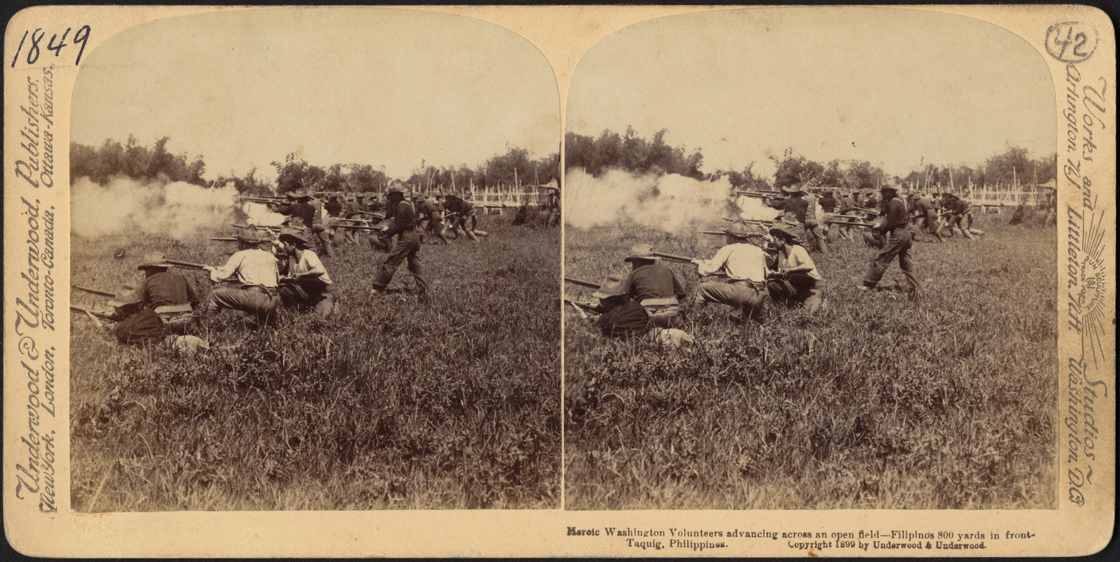 Heroic Washington Volunteers advancing across an open field - Filipinos 800 yards in front - Taquig, Philippines