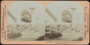 Hoisting the 6 in. gun shield. Wreck of U.S. battleship "Maine"