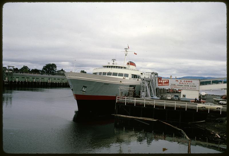 M.V. Coho ferry and sign advertising trips to Port Angeles, Washington