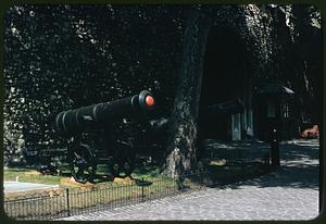 Cannons by stone wall, Tower of London