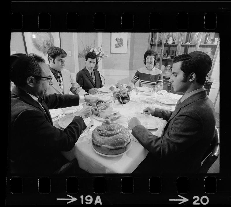 Lensen family eats Hanukkah dinner, Brookline