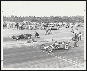 Sanford Maine. Nearest Dragster holds East Coast record 160.47 mph. Side botham engineering special - blown injected olds sponsored by company of some name Burlingston Mass. For dragster Pontiac B Dragster owned by David Sandenson Greenland New Hemp.