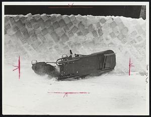 Swiss Miss-Switzerland's bobsled turned over after crossing the finish line during a training run for the world championships at Garmisch-Partenkirchen, Germany. Roger Wicky, the pilot, and his three teammates were slightly injured in the accident.