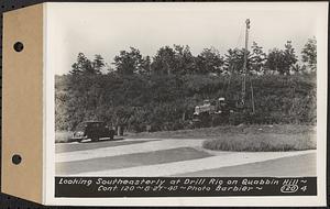 Contract No. 120, Drilling a Well for Water Supply for Quabbin Hill Buildings, Ware, looking southeasterly at drill right on Quabbin Hill, Ware, Mass., Aug. 27, 1940