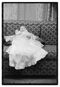 Unidentified baby, possibly in a christening gown