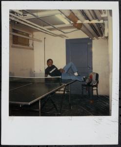 Boy posing on ping pong table