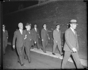 Medical examiner McGrath and witnesses going into state prison to see Millen brothers and Faber [burn?] for murder of two policemen and others
