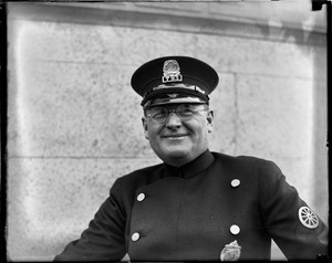 Eddie de Roche, smiling cop on duty on corner of Tremont and Avery Streets