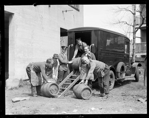 Police from Division 9 with casks seized during Prohibition