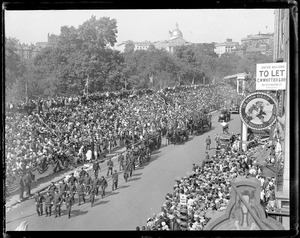 Big parade in Boston - 300th anniversary. Largest crowd in stands to see this historical sight - in front of the Old Herald Building, Tremont St. and Avery.