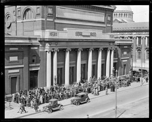 Early comers stand in line outside Symphony Hall to get seats