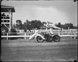 Ray Grant and Peewee Cullum of Portland, Oregon perform with motorcycle at Topsfield Fair