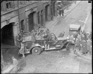 Parked car blocks Fire Department truck