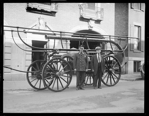 Old fashioned fire engine a Charlestown station