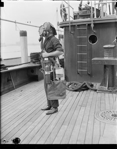 Fireboat crew member with breathing apparatus
