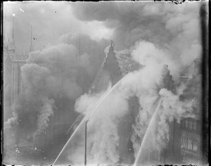 Remarkable fire picture of a watertower in action - taken from a high building as the YMCA was going up in flames. Boylston St.