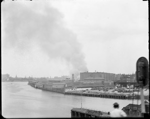 Chelsea Ferry burning on the Boston side taken through Boston elevated window while going over Charlestown Bridge
