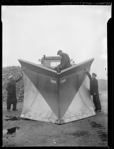 Men with snowplow