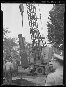 Men at work with crane