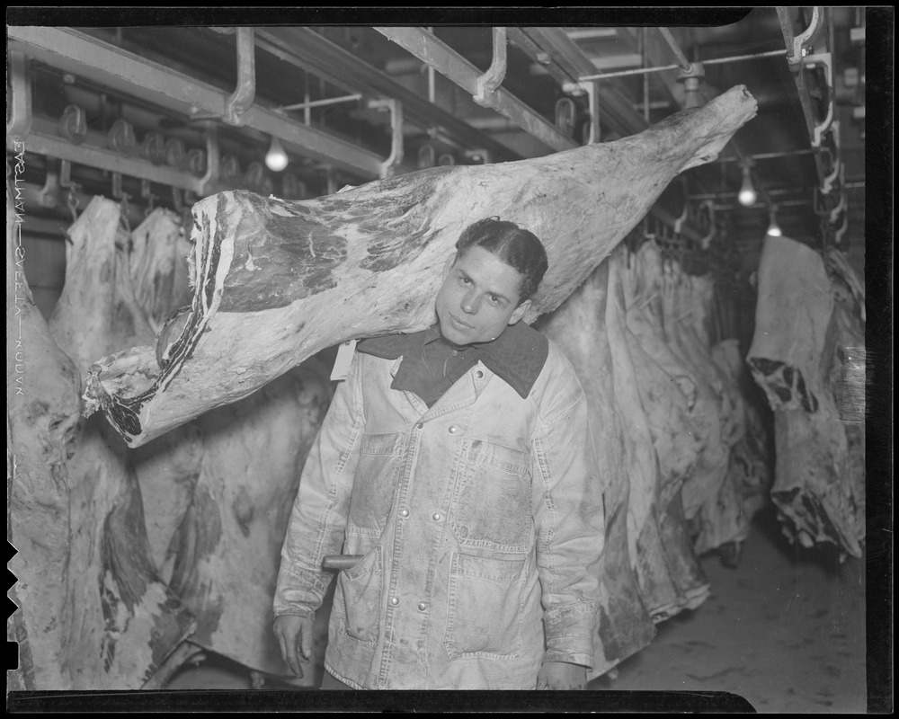 Worker in meat locker