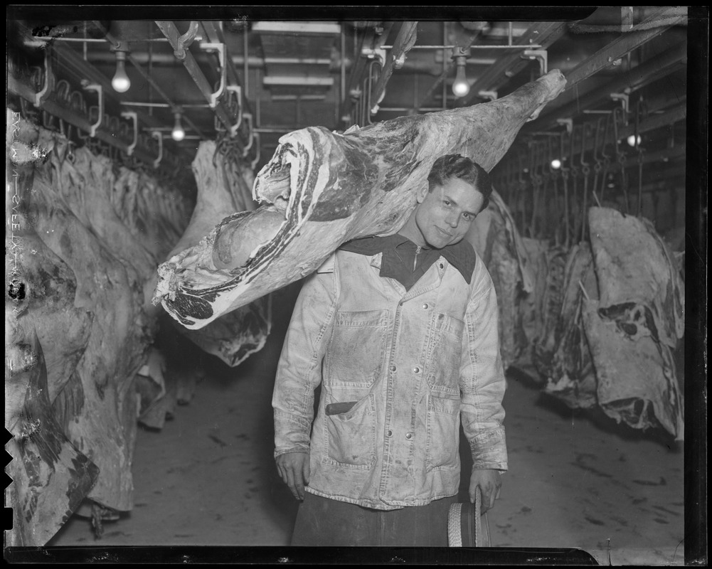 Worker in meat locker