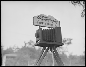 Silent advertising, camera in front of house, Duxbury, Massachusetts