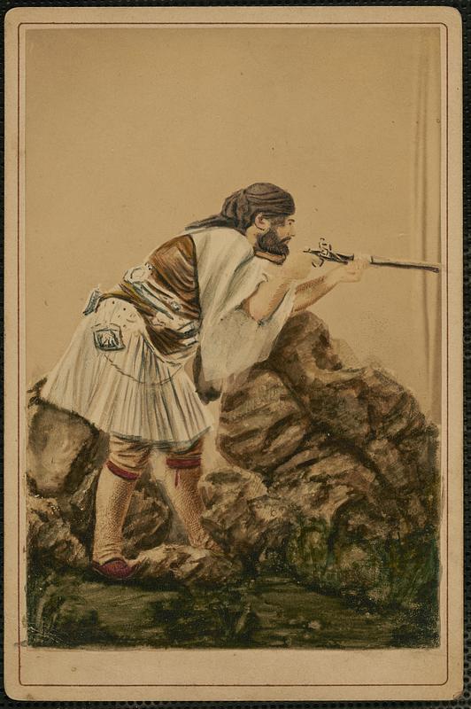 Bearded man in Grecian costume aiming rifle