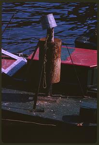 Small boat with post, likely Boston