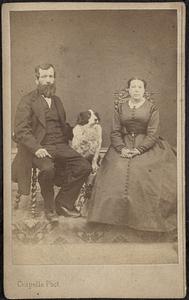 Unidentified woman and man with dog