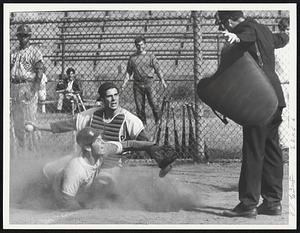 Checking Signal - East Boston's Mickey Forlizzi and South Boston catcher Ed Foley look to umpire, who calls Forlizzi safe on sacrifice fly in sixth inning of game at South Boston.