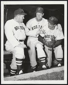 Words Of The Master are heeded at the Red Sox Sarasota Training camp where (left to right) Master Joe McCarthy gives out as Pitcher Ellis Kinder and Third Baseman Johnny Pesky listen attentively.