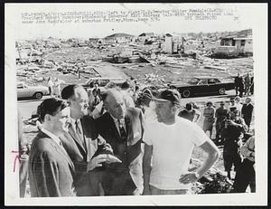 Minneapolis, Minn: (left to right) U.S. Senator Walter Mondale (D-Minn): Vice President Humphrey: Minnesota Governor Karl Rolvaag talk with tornado home owner John Markfelder at suburban Fridley, Minn., here 5/9.