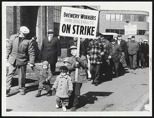 Little Pickets showed up to help their father in the brewery workers union strike in Charlestown today. Their father is Lawrence O’Connor, left, of Belmont. They are Timothy O’Connor, 8, Margaret, 4, Lawrence, 3, and Penny, 2.