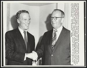 Victorious Democratic gubernatorial candidate Mayor Kevin White (L) shakes hands with the man he nosed out in close primary race, Senate Pres. Maurice Donahue, at uniy meeting, Parker House (9/16). Donahue, and the other two losers, former Lt. Gov. Frank Bellotti and former presidential aide Kenneth O'Donnell, all pledged their aid to White, for (11/70) election.