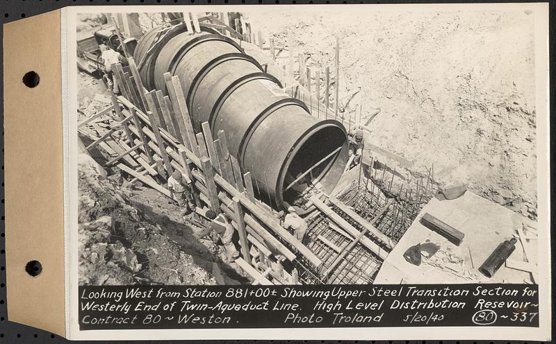 Contract No. 80, High Level Distribution Reservoir, Weston, looking west from Sta. 881+00+/- showing upper steel transition section for westerly end of twin aqueduct line, high level distribution reservoir, Weston, Mass., May 20, 1940