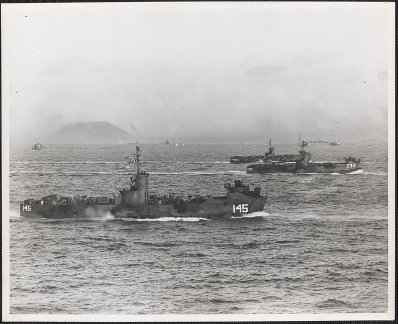 Loaded with battle-wise Marines of the Fifth Amphibious Corps, LSMs, (Landing Ship Medium), dash for the beach at Iwo Jima